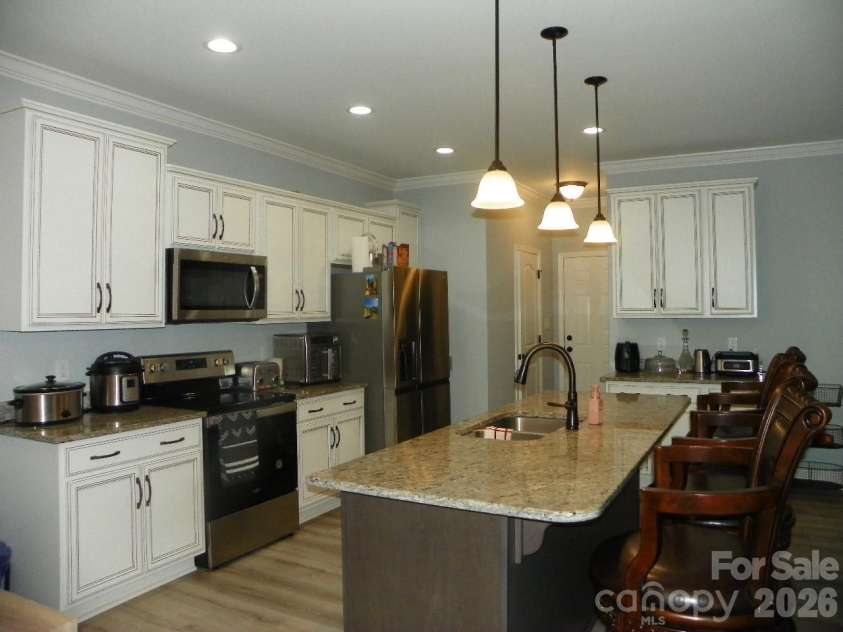 128 Summer Lake Drive, New London, NC 28127.  MLS# CAR4337429, YatesRealty ID 1050. 