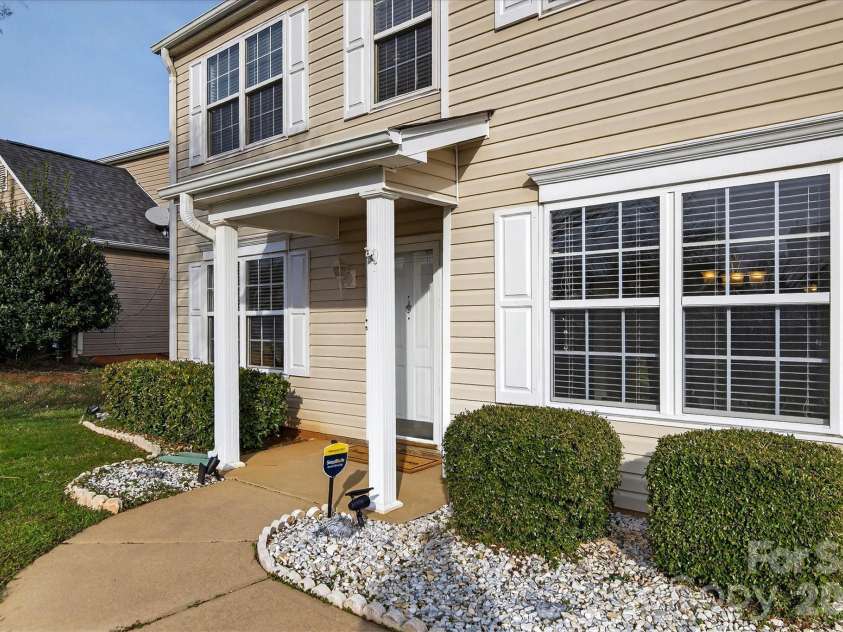 9830 Avensong Crossing Drive, Charlotte, NC 28215.  MLS# CAR4351576, YatesRealty ID 10500. Covered front porch!