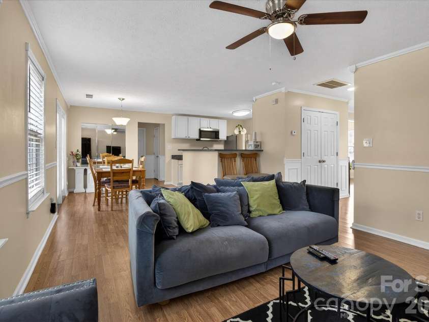 9830 Avensong Crossing Drive, Charlotte, NC 28215.  MLS# CAR4351576, YatesRealty ID 10500. Flows effortlessly into the Dining Area and Kitchen!