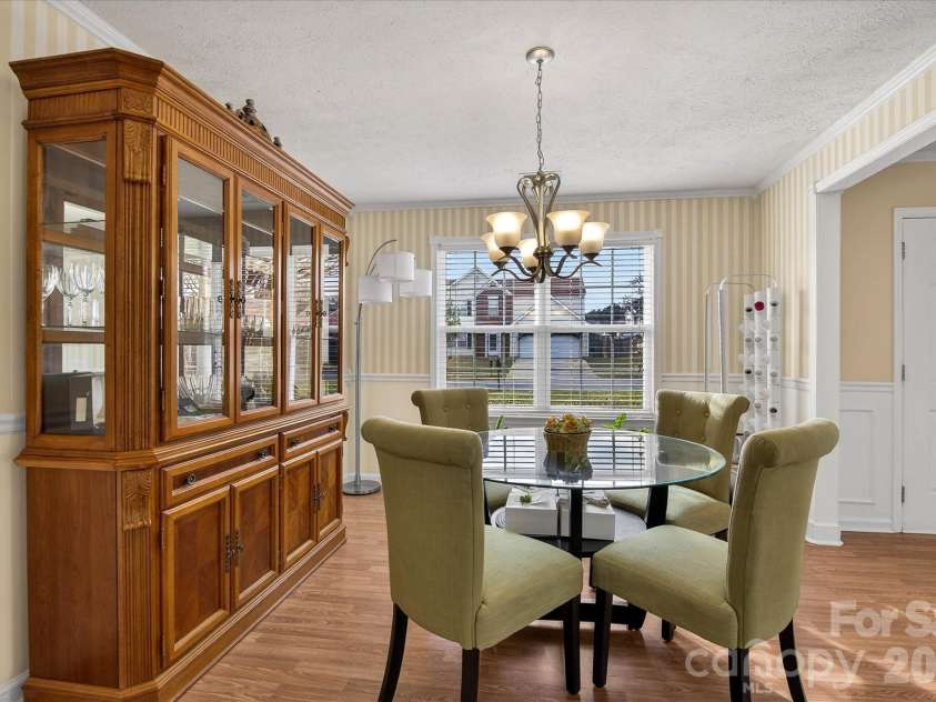 9830 Avensong Crossing Drive, Charlotte, NC 28215.  MLS# CAR4351576, YatesRealty ID 10500. Formal Dining Room!