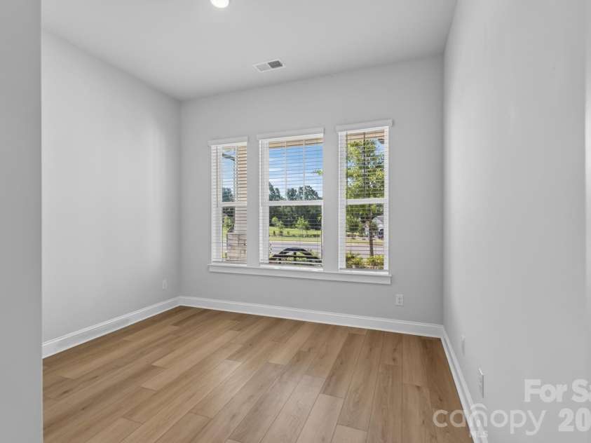 1306 Idyllic Lane, Waxhaw, NC 28173.  MLS# CAR4400609, YatesRealty ID 10501. Front Secondary Bedroom
