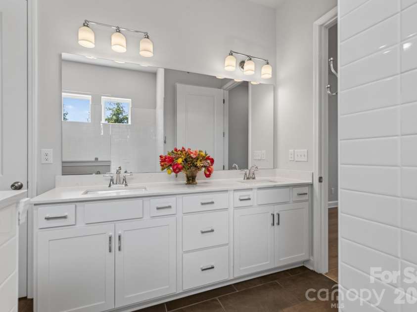 1306 Idyllic Lane, Waxhaw, NC 28173.  MLS# CAR4400609, YatesRealty ID 10501. Primary Bathroom Vanities