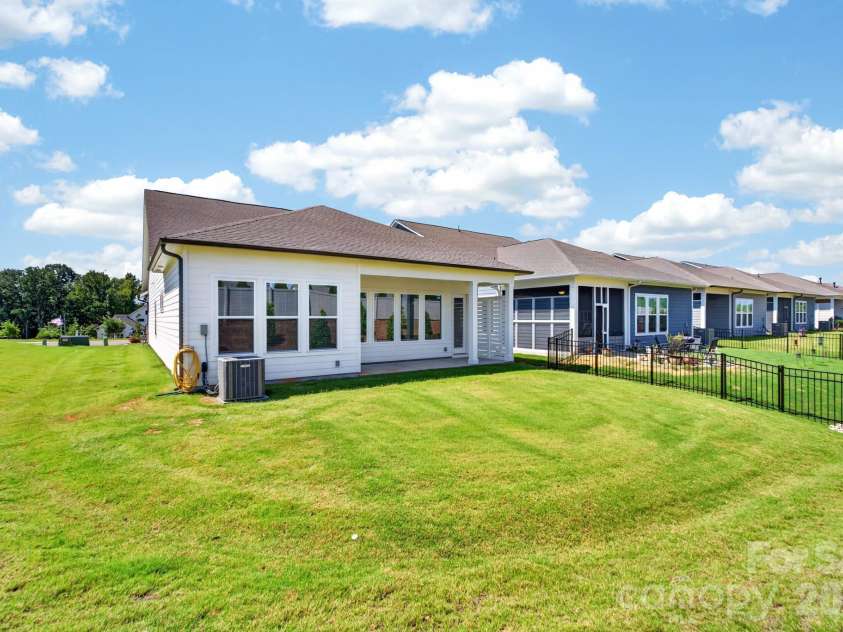 1306 Idyllic Lane, Waxhaw, NC 28173.  MLS# CAR4400609, YatesRealty ID 10501. Rear Exterior