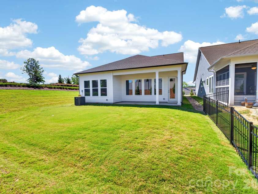1306 Idyllic Lane, Waxhaw, NC 28173.  MLS# CAR4400609, YatesRealty ID 10501. Rear Exterior