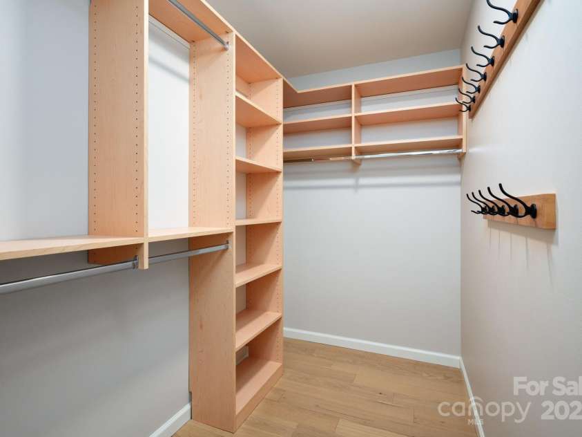 19 Beekeeper Trail, Swannanoa, NC 28778.  MLS# CAR4251601, YatesRealty ID 10506. Walk-In Closet with Built-In Organization
