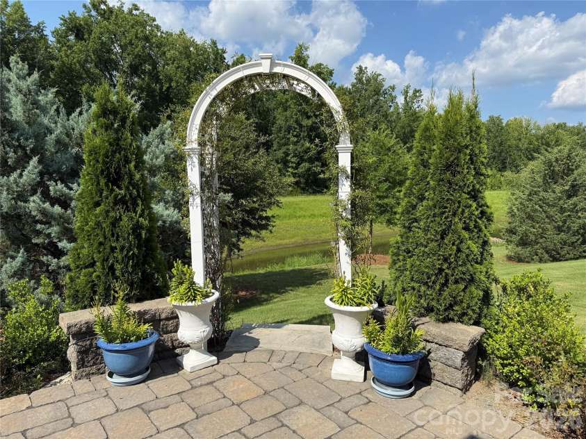 2141 Bud Court, Fort Mill, SC 29715.  MLS# CAR4363745, YatesRealty ID 10511. Backyard Arbor