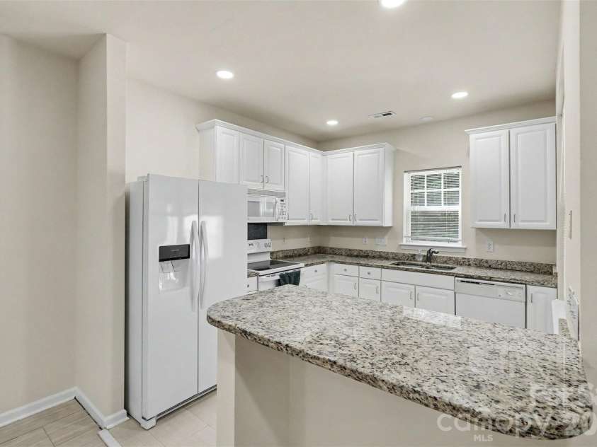 16914 Commons Creek Drive, Charlotte, NC 28277.  MLS# CAR4364676, YatesRealty ID 10512. Upgraded kitchen cabinet paint
