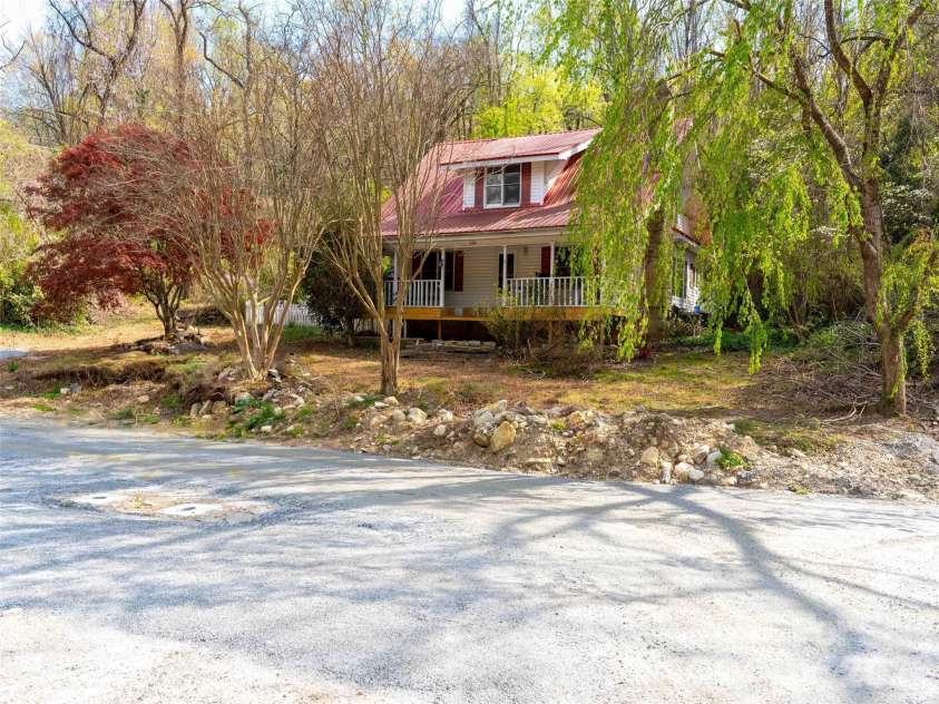 306 Southside Drive, Chimney Rock, NC 28720.  MLS# CAR4365604, YatesRealty ID 10518. 