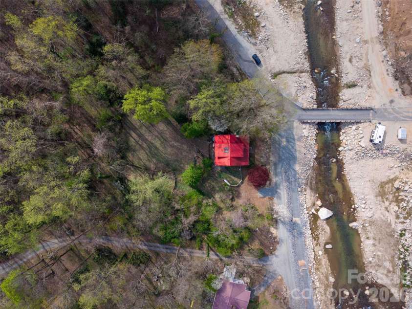 306 Southside Drive, Chimney Rock, NC 28720.  MLS# CAR4365604, YatesRealty ID 10518. 