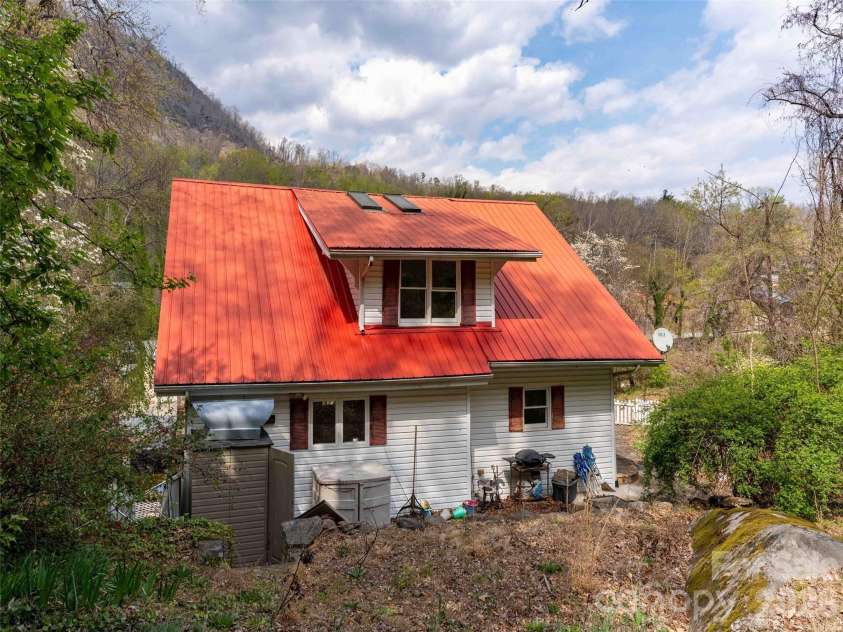 306 Southside Drive, Chimney Rock, NC 28720.  MLS# CAR4365604, YatesRealty ID 10518. 