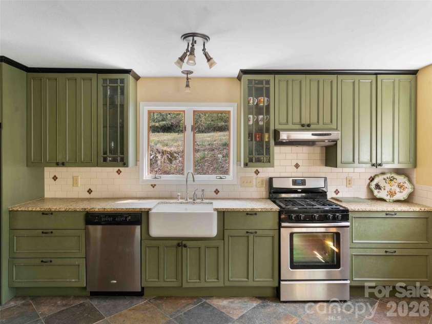 306 Southside Drive, Chimney Rock, NC 28720.  MLS# CAR4365604, YatesRealty ID 10518. 
