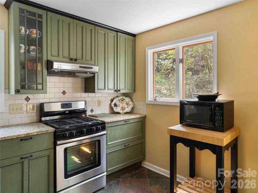 306 Southside Drive, Chimney Rock, NC 28720.  MLS# CAR4365604, YatesRealty ID 10518. 