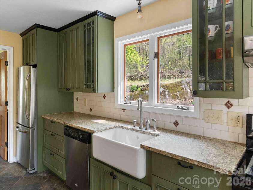 306 Southside Drive, Chimney Rock, NC 28720.  MLS# CAR4365604, YatesRealty ID 10518. 