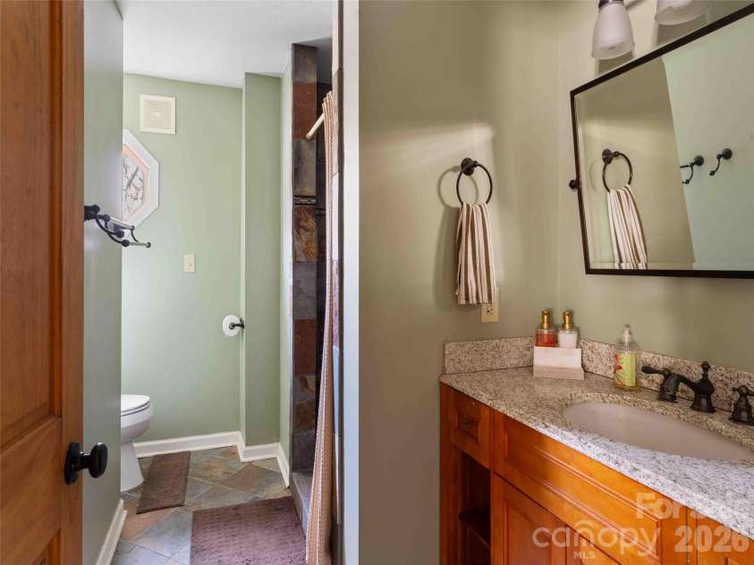 306 Southside Drive, Chimney Rock, NC 28720.  MLS# CAR4365604, YatesRealty ID 10518. 