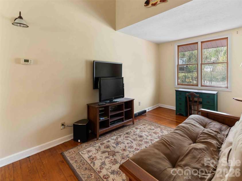 306 Southside Drive, Chimney Rock, NC 28720.  MLS# CAR4365604, YatesRealty ID 10518. 