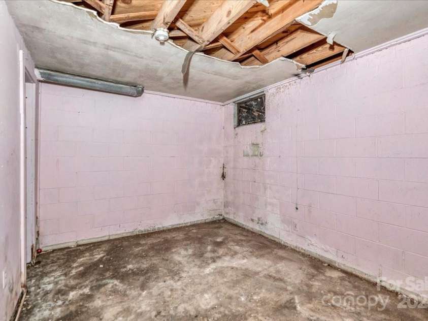 714 Pine Street, Hamlet, NC 28345.  MLS# CAR4267814, YatesRealty ID 10519. Basement bedroom #1