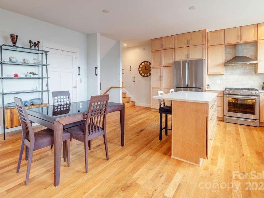 406 Kessler Place, Asheville, NC 28804.  MLS# CAR4172297, YatesRealty ID 1052. Dining space leading to a  chefs kitchen!