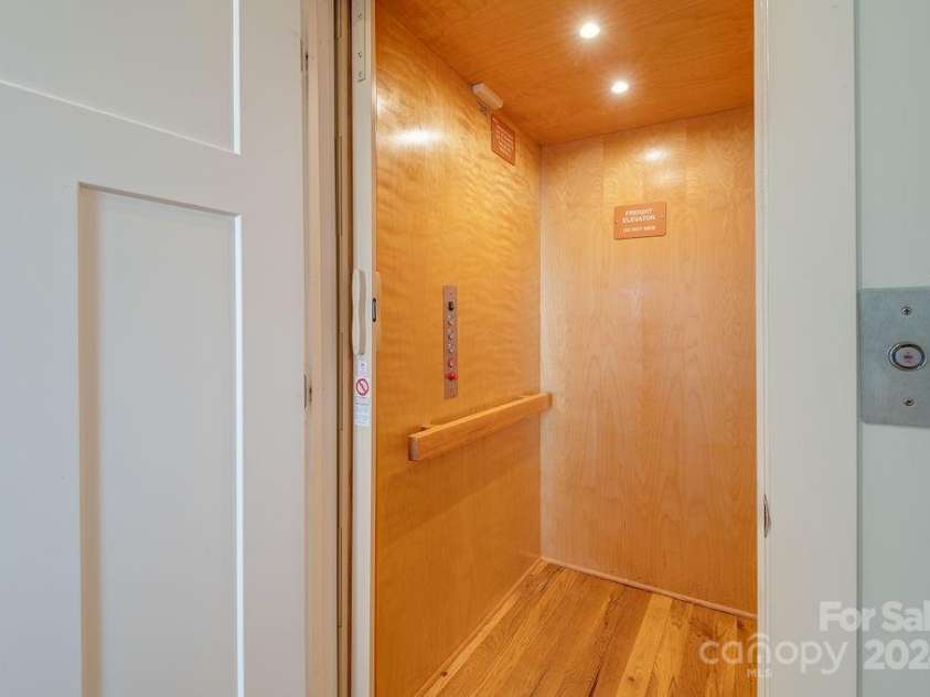 406 Kessler Place, Asheville, NC 28804.  MLS# CAR4172297, YatesRealty ID 1052. Elevator.