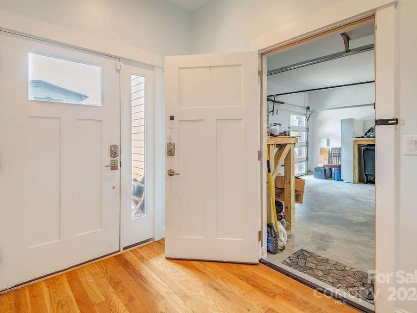 406 Kessler Place, Asheville, NC 28804.  MLS# CAR4172297, YatesRealty ID 1052. Entrance to lower level foyer.