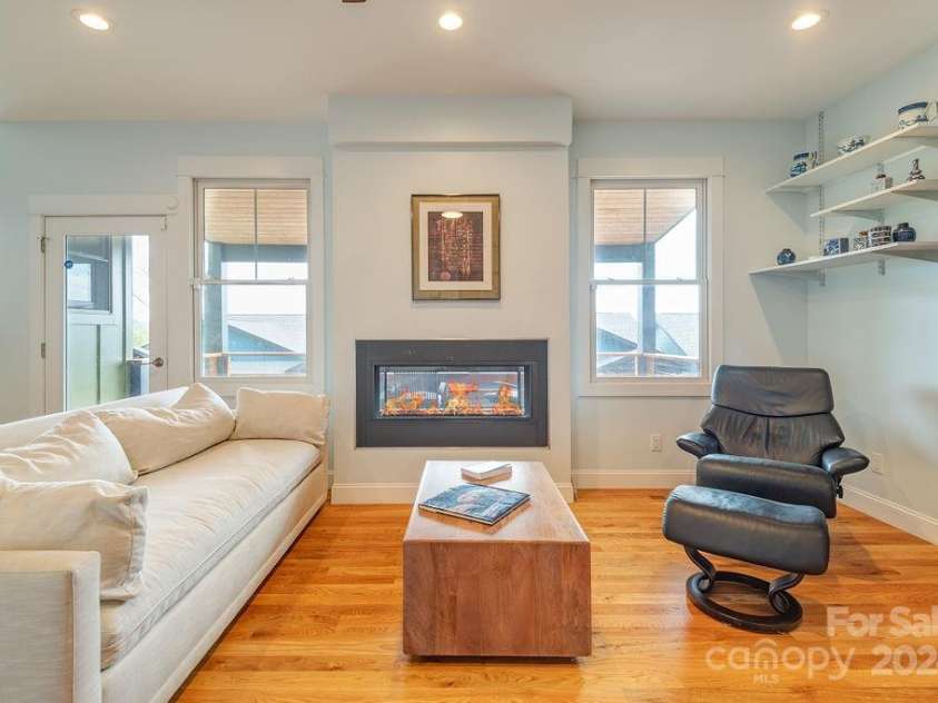 406 Kessler Place, Asheville, NC 28804.  MLS# CAR4172297, YatesRealty ID 1052. Fire is virtually enhanced.