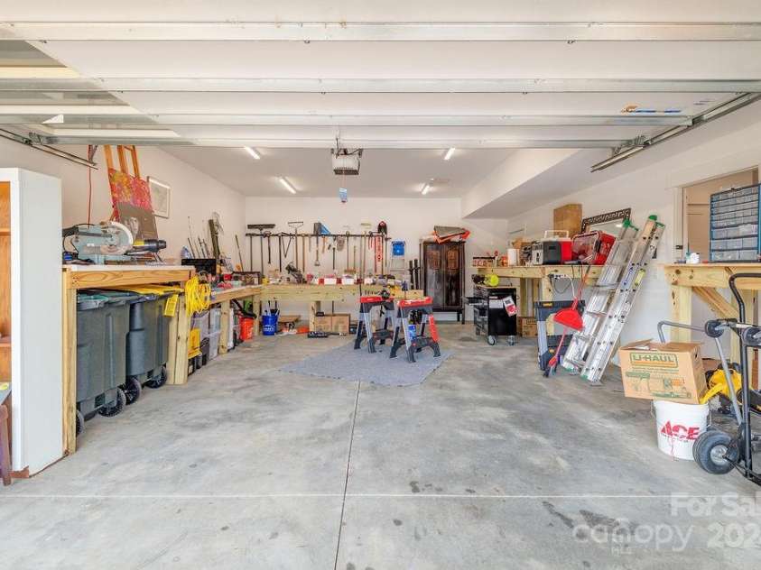 406 Kessler Place, Asheville, NC 28804.  MLS# CAR4172297, YatesRealty ID 1052. Oversized 2 car garage with great storage.