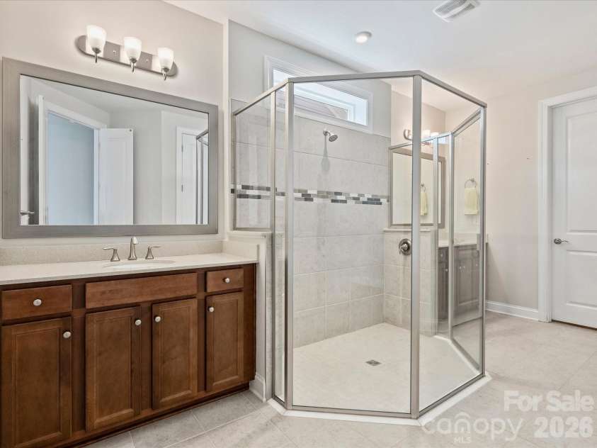 10404 Superb Lane, Charlotte, NC 28215.  MLS# CAR4365905, YatesRealty ID 10520. Primary bath with dual vanities