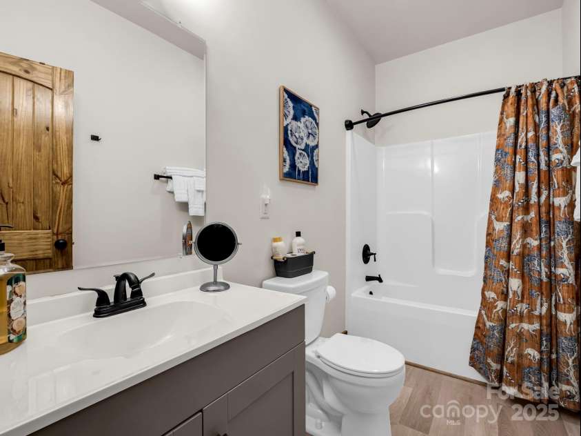 131 Pierpoint Drive, Lake Lure, NC 28746.  MLS# CAR4211806, YatesRealty ID 10522. Guest bathroom