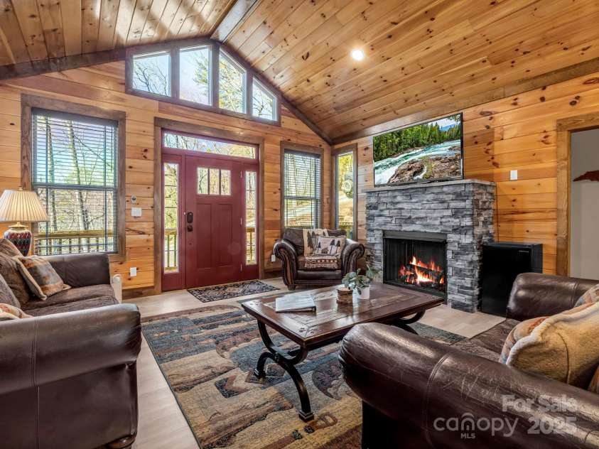 131 Pierpoint Drive, Lake Lure, NC 28746.  MLS# CAR4211806, YatesRealty ID 10522. Living room