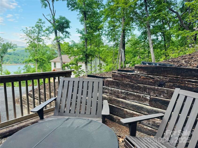 131 Pierpoint Drive, Lake Lure, NC 28746.  MLS# CAR4211806, YatesRealty ID 10522. Outdoor fire pit with mountain & Lake views