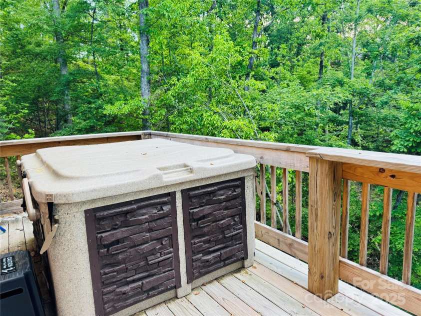 131 Pierpoint Drive, Lake Lure, NC 28746.  MLS# CAR4211806, YatesRealty ID 10522. Private deck w/ hot tub