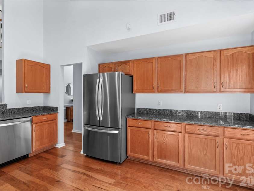 13312 Fremington Road, Huntersville, NC 28078.  MLS# CAR4363449, YatesRealty ID 10524. Tons of cabinets plus a pantry create ample storage space.