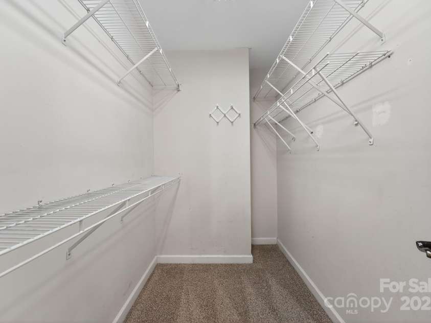 9238 Heritage Woods Place, Charlotte, NC 28269.  MLS# CAR4298360, YatesRealty ID 10525. Primary Closet