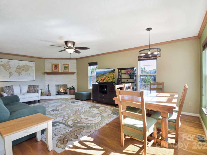308 Lakeview Drive, Deep Gap, NC 28618.  MLS# CAR4243724, YatesRealty ID 10533. Second-level entrance to living room w/fire place and dining area