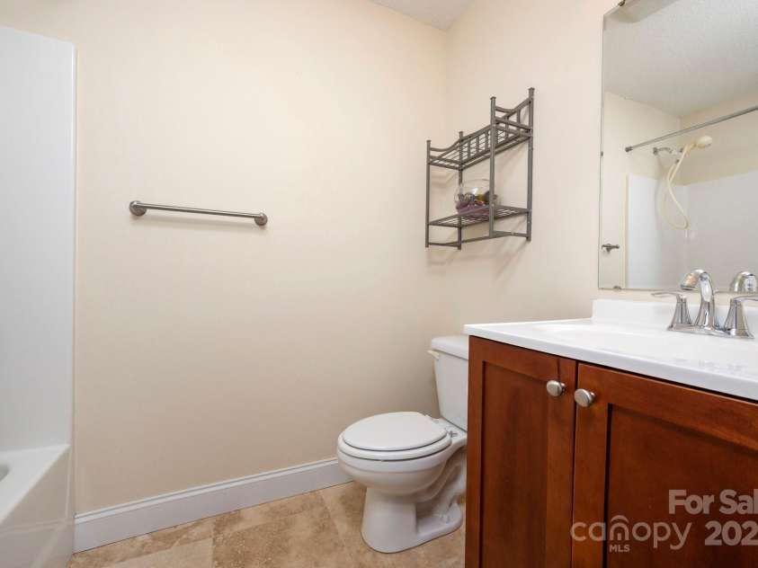 29 Honey Hollow Lane, Fairview, NC 28730.  MLS# CAR4270487, YatesRealty ID 10537. Main bathroom 
