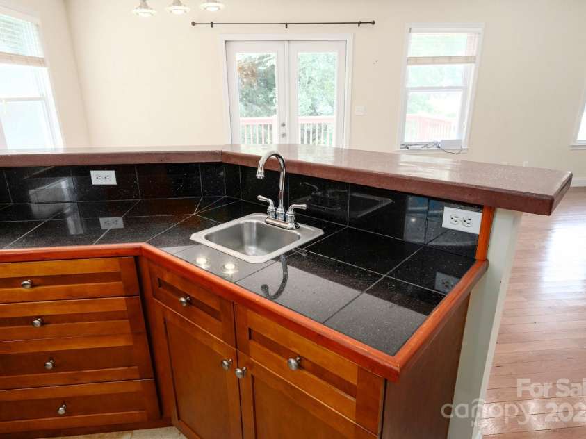 29 Honey Hollow Lane, Fairview, NC 28730.  MLS# CAR4270487, YatesRealty ID 10537. Prep sink for added ease