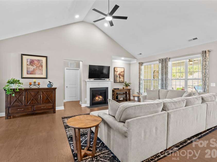 198 Hunters Hill Drive, Statesville, NC 28677.  MLS# CAR4366178, YatesRealty ID 10541. High vaulted ceiling with ceiling fan, engineered flooring