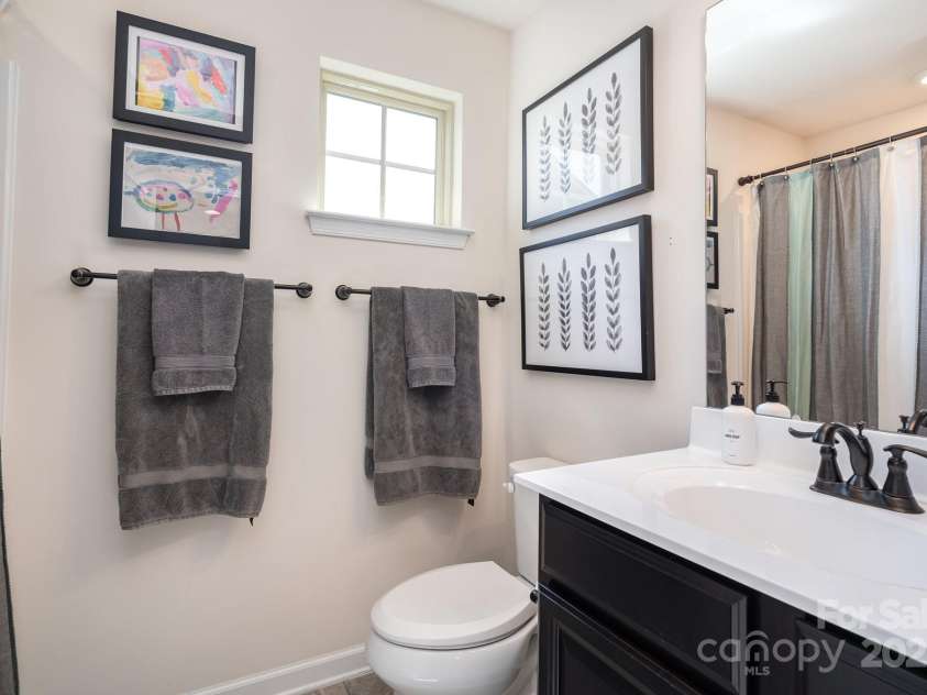3614 Dolly Madison Road, Charlotte, NC 28208.  MLS# CAR4237478, YatesRealty ID 10542. Hall Bathroom