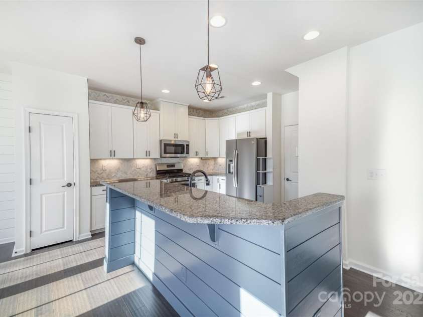 3614 Dolly Madison Road, Charlotte, NC 28208.  MLS# CAR4237478, YatesRealty ID 10542. Island with Bar Seating