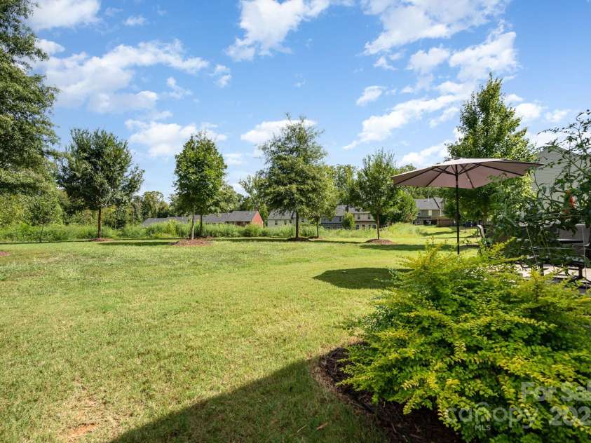 3614 Dolly Madison Road, Charlotte, NC 28208.  MLS# CAR4237478, YatesRealty ID 10542. Left Rear Yard