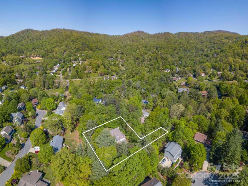 35 Mann Drive, Asheville, NC 28805.  MLS# CAR4252485, YatesRealty ID 10548. An aerial view of the lot as well as the surrounding area.  The Blue Ridge Parkway is nearby!