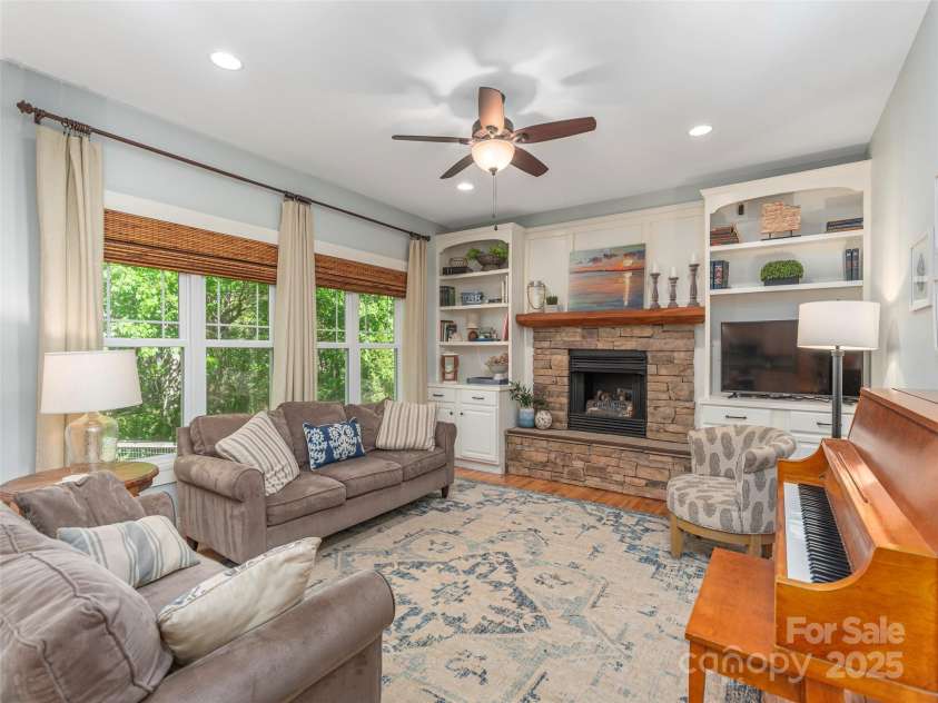 35 Mann Drive, Asheville, NC 28805.  MLS# CAR4252485, YatesRealty ID 10548. Another look into the Family Room with updated window treatments and plenty of natural light