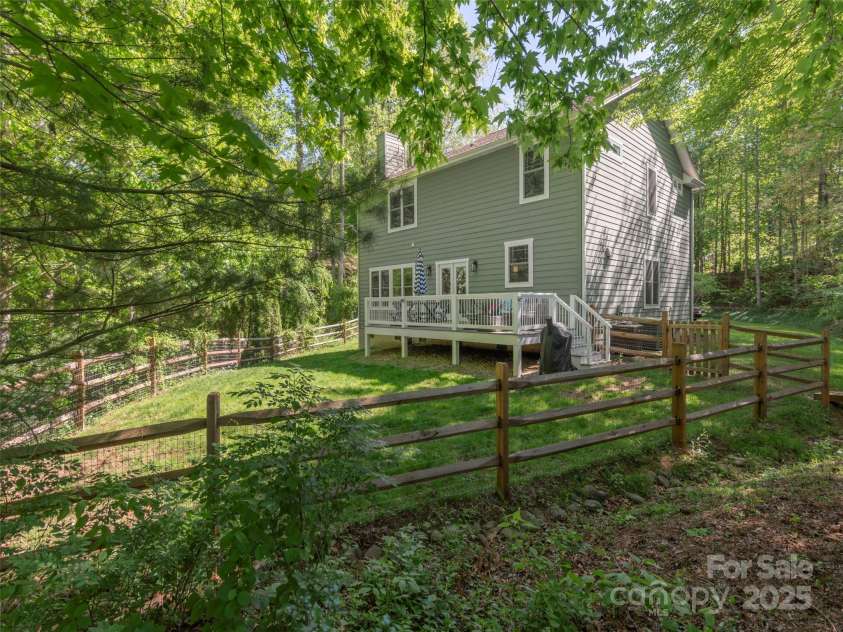 35 Mann Drive, Asheville, NC 28805.  MLS# CAR4252485, YatesRealty ID 10548. Another look of the yard space and entertainment area of the back deck