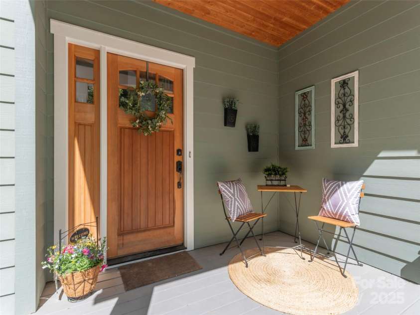 35 Mann Drive, Asheville, NC 28805.  MLS# CAR4252485, YatesRealty ID 10548. Enjoy a peaceful day or evening on your recently painted front porch