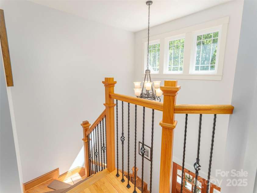 35 Mann Drive, Asheville, NC 28805.  MLS# CAR4252485, YatesRealty ID 10548. From the landing above the entry to the home - all freshly painted