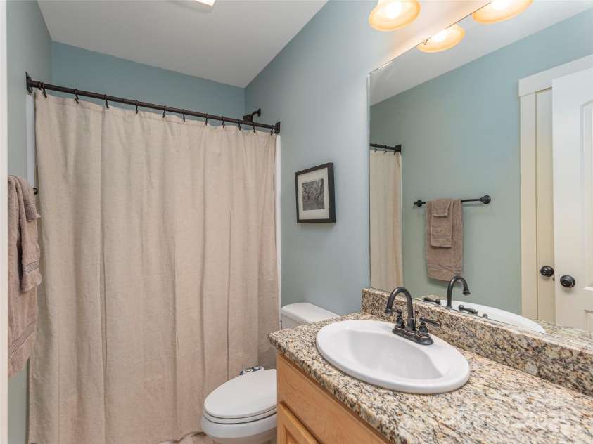 35 Mann Drive, Asheville, NC 28805.  MLS# CAR4252485, YatesRealty ID 10548. Guest bath with shower/tub combo
