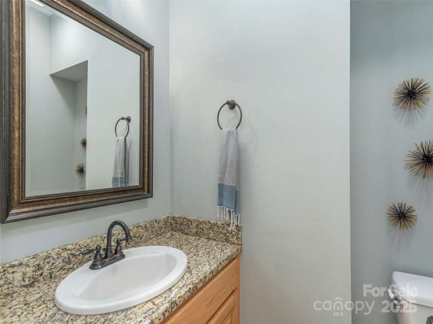 35 Mann Drive, Asheville, NC 28805.  MLS# CAR4252485, YatesRealty ID 10548. Half bath on the main level