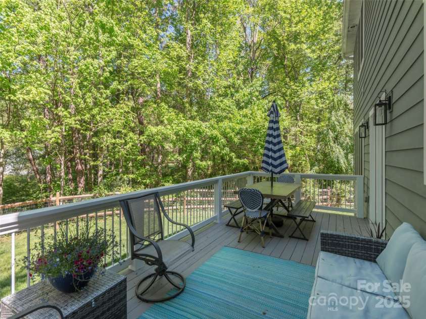 35 Mann Drive, Asheville, NC 28805.  MLS# CAR4252485, YatesRealty ID 10548. Large back deck freshly painted