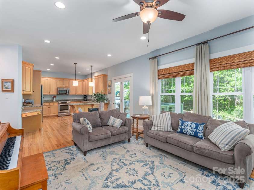 35 Mann Drive, Asheville, NC 28805.  MLS# CAR4252485, YatesRealty ID 10548. Open living space from the Family Room into the Kitchen, with the gleaming HW floors