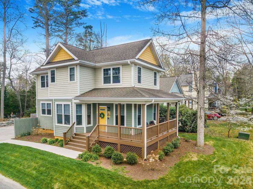 8 Lamar Avenue, Asheville, NC 28803.  MLS# CAR4365889, YatesRealty ID 10551. Corner lot, lush yard, covered sitting porch