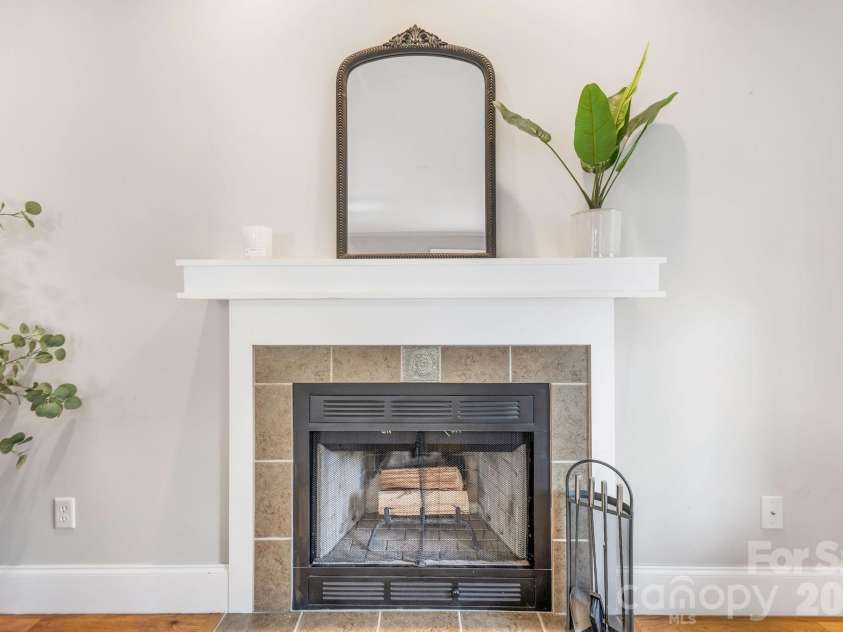 8 Lamar Avenue, Asheville, NC 28803.  MLS# CAR4365889, YatesRealty ID 10551. Wood burning fireplace